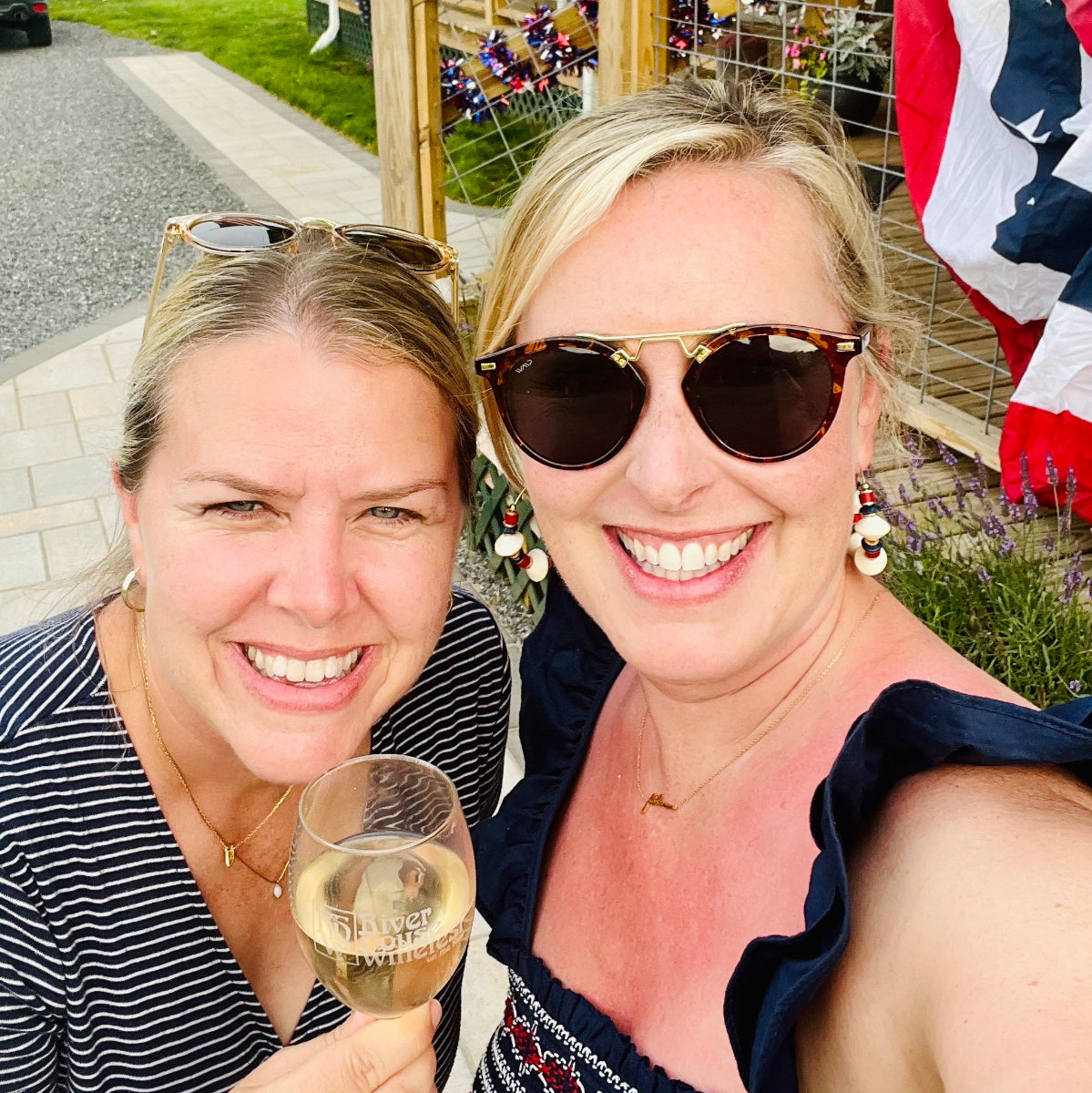 Two women outside at The Old Store in Graassy Creek North Carolina
